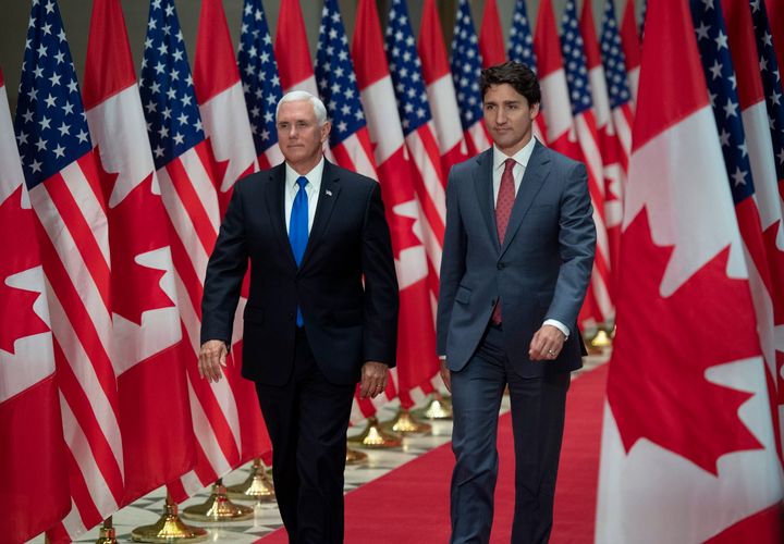 Prime Minister Justin Trudeau and U.S. Vice-President Mike Pence arrive for a joint news conference in Ottawa on May 30, 2019.