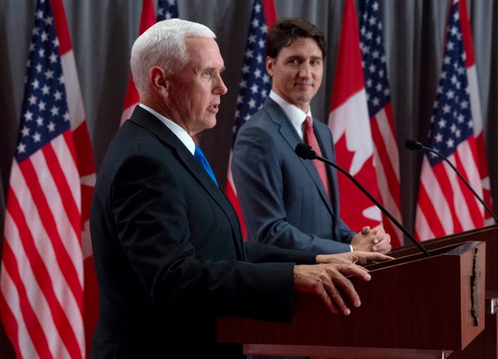 Prime Minister Justin Trudeau listens as U.S. Vice-President Mike Pence makes his opening statement during a joint news conference in Ottawa on May 30, 2019.