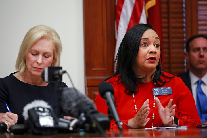 Presidential candidate and New York Sen. Kristin Gillibrand (left) joins Georgia state Sen. Nikema Williams in Atlanta after Georgia Gov. Brian Kemp signed House Bill 481 into law.