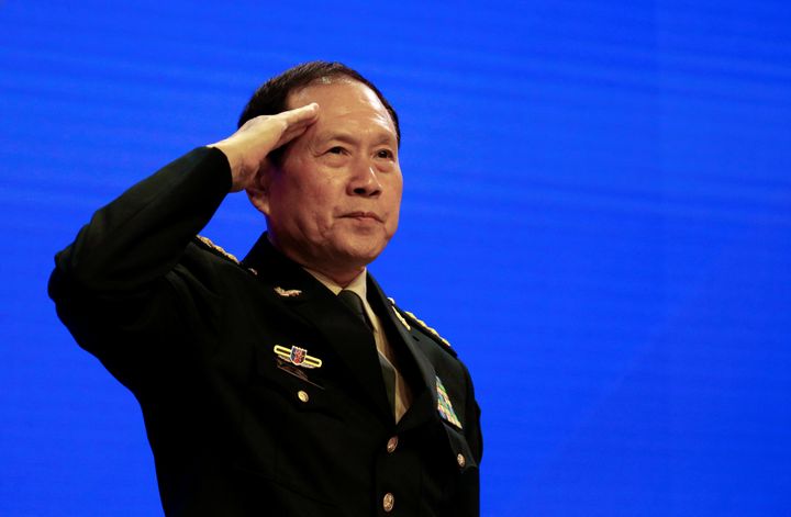 Chinese Defense Minister Wei Fenghe salutes at the IISS Shangri-la Dialogue in Singapore, June 2, 2019. 