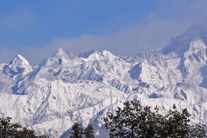 A view of the Himalayan range including Trishul, Nanda Devi and Chaukhamba in the Rudrapragya District of Uttarakhand, India 