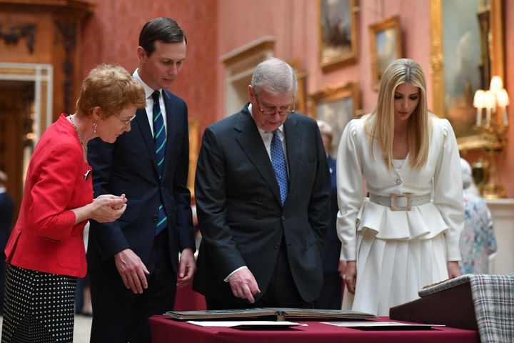 Jared Kushner and Ivanka Trump (left and right) are shown an exhibit from the Royal Collection by Prince Andrew (centre).