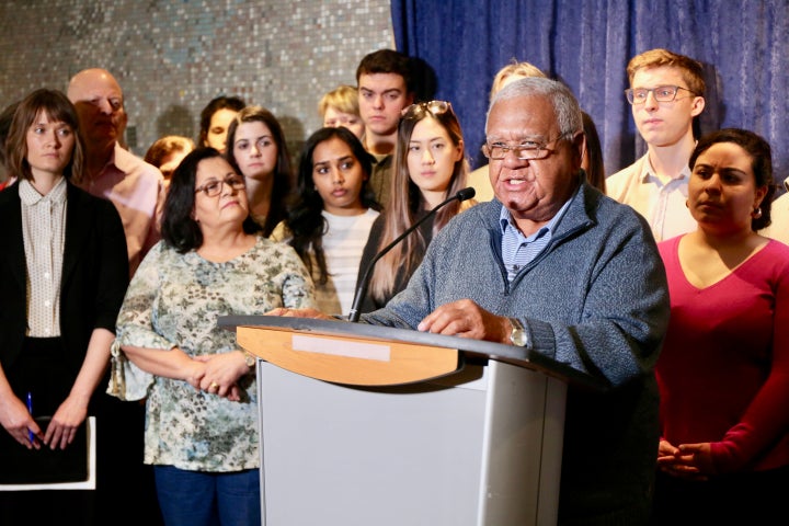 Neville Jacobs spoke at a news conference at Toronto city hall in May to protest the legal aid cuts. He was joined by advocates, city councillors, lawyers and law students.