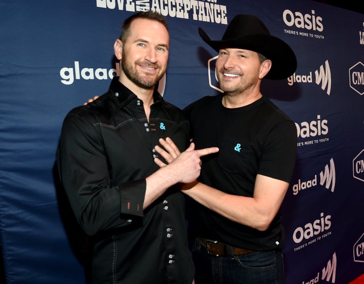 Singer Ty Herndon (right) with his longtime partner, Matthew Collum, in 2018. 