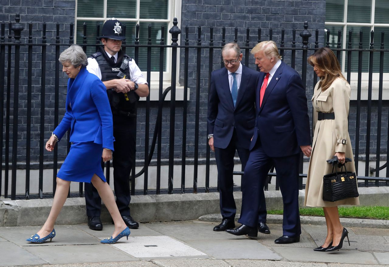 Prime Minister Theresa May and her husband Philip greet Donald Trump and first lady Melania outside 10 Downing Street in central London, Tuesday, June 4, 2019. <a href="https://www.huffingtonpost.co.uk/entry/theresa-may-donald-trump-handshake_uk_5cf64d83e4b0e346ce84a759?utm_hp_ref=uk-homepage" role="link" class=" js-entry-link cet-internal-link" data-vars-item-name="May and Trump didn&#x27;t shake hands during the meeting" data-vars-item-type="text" data-vars-unit-name="5cf69184e4b0aa9115144838" data-vars-unit-type="buzz_body" data-vars-target-content-id="https://www.huffingtonpost.co.uk/entry/theresa-may-donald-trump-handshake_uk_5cf64d83e4b0e346ce84a759?utm_hp_ref=uk-homepage" data-vars-target-content-type="buzz" data-vars-type="web_internal_link" data-vars-subunit-name="article_body" data-vars-subunit-type="component" data-vars-position-in-subunit="5">May and Trump didn't shake hands during the meeting</a>.