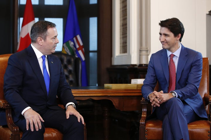 Premier of Alberta Jason Kenney speaks to Prime Minister Trudeau on Parliament Hill in Ottawa on May 2, 2019. 