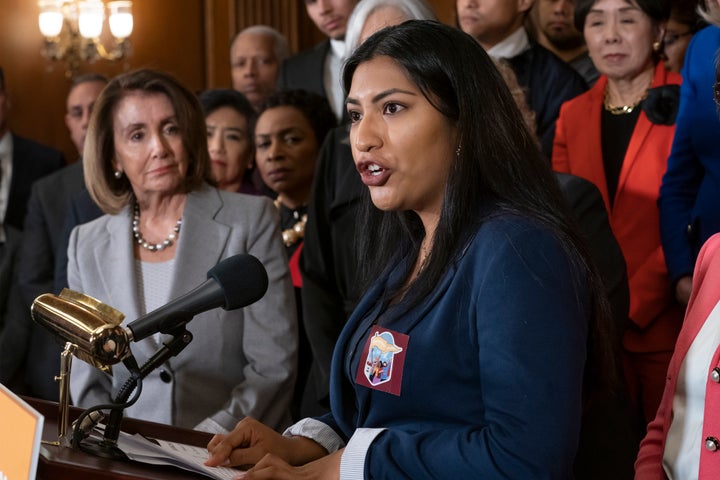 House Speaker Nancy Pelosi (D-Calif.), left, listens to the life story of Jesica Garcia, from the Los Angeles area, as House Democrats introduce The Dream and Promise Act on March 12.