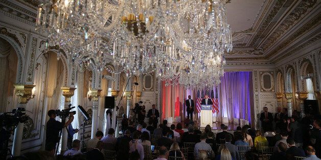 PALM BEACH, FL - MARCH 11: Republican presidential candidate Donald Trump speaks as he stands with former presidential candidate Ben Carson as he receives his endorsement at the Mar-A-Lago Club on March 11, 2016 in Palm Beach, Florida. Presidential candidates continue to campaign before Florida's March 15th primary day. (Photo by Joe Raedle/Getty Images)