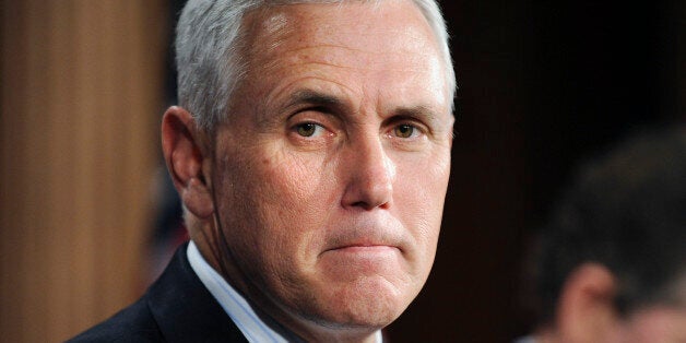 U.S. Representative Mike Pence (R-IN) arrives for a news conference about their goal of permanently extending Bush-era tax rates at the Capitol in Washington, DC, U.S. on December 2, 2010. REUTERS/Jonathan Ernst/File Photo