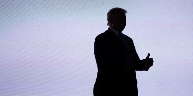 Republican presidential candidate Donald Trump gives a thumbs up as he arrives to introduce his wife Melania during the Republican National Convention, Monday, July 18, 2016, in Cleveland. (AP Photo/Evan Vucci)