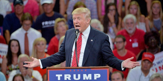 WILMINGTON, NC - AUGUST 9: Republican presidential candidate Donald Trump addresses the audience during a campaign event at