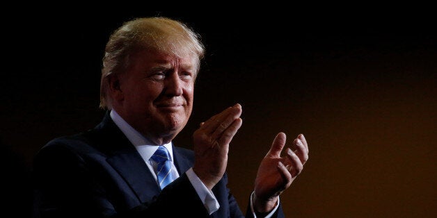 Republican presidential nominee Donald Trump speaks at a campaign rally in Phoenix, Arizona, U.S., August 31, 2016. REUTERS/Carlo Allegri