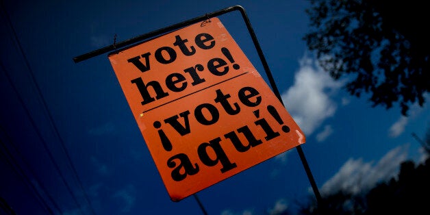 A sign indicates an early voting polling place at the Potomac Community Recreation Center on October 28, 2016 in Potomac, Mar