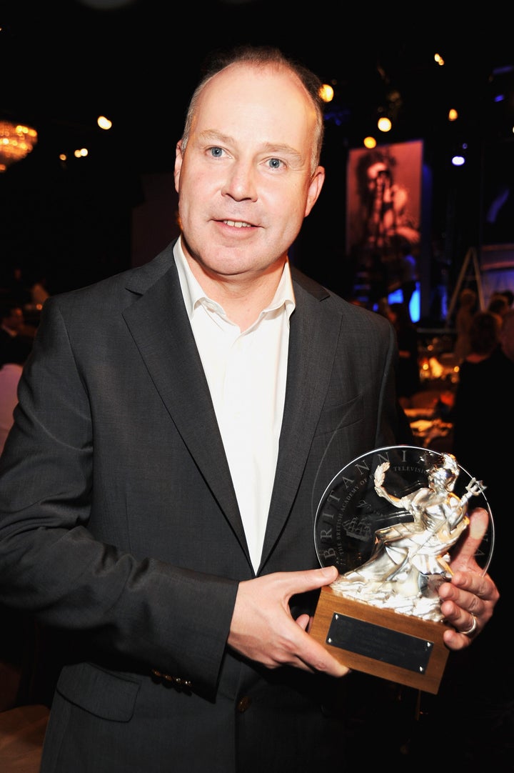 BEVERLY HILLS, CA - NOVEMBER 30: Honoree David Yates poses with the John Schlesinger Britannia Award for Artistic Excellence