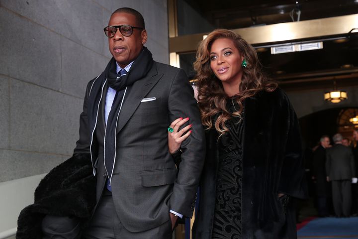 WASHINGTON, DC - JANUARY 21: Jay-Z and Beyonce arrive at the presidential inauguration on the West Front of the U.S. Capitol January 21, 2013 in Washington, DC. Barack Obama was re-elected for a second term as President of the United States. (Photo by Win McNamee/Getty Images)