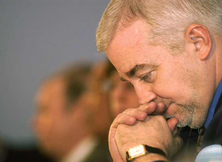 LONDON - FEBRUARY 18: Reverend Jim Wallis (L), editor-in-chief of the 'Sojourners' Community', a Christian justice and peace group based in Washington, DC, attends a media conference after meeting with UK Prime Minister Tony Blair to discuss a possible war against Iraq February 18, 2003 in London. Wallis led a delegation of American church leaders challenging Blair's moral case for war. (Photo by Graeme Robertson/Getty Images)