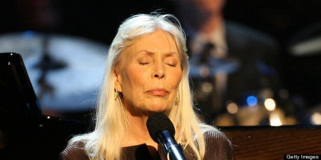 HOLLYWOOD - OCTOBER 28: Musician Joni Mitchell on stage at The Thelonious Monk Institute of Jazz and The Recording Academy Los Angeles chapter honoring Herbie Hancock all star tribute concert at the Kodak Theatre on October 28, 2007 in Hollywood, California. (Photo by Maury Phillips/WireImage) 