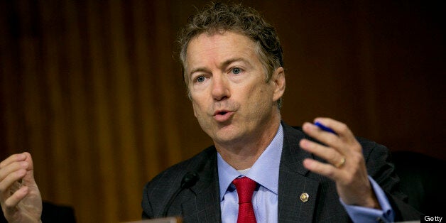 Senator Rand Paul, a Republican from Kentucky, questions witnesses during a Senate Permanent Subcommittee on Investigations hearing in Washington, D.C., U.S., on Tuesday, May 21, 2013. Apple Inc. Chief Executive Officer Tim Cook will face off against U.S. senators leveling accusations the iPhone maker has created a web of offshore entities to avoid paying billions of dollars in U.S. taxes. Photographer: Andrew Harrer/Bloomberg via Getty Images