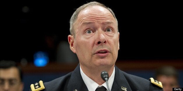 National Security Agency Director General Keith Alexander testifies before the House Select Intelligence Committee on the NSA's PRISM program, which tracks web traffic and US citizens' phone records, during a hearing on Capitol Hill in Washington, DC, June 18, 2013. AFP PHOTO / Saul LOEB (Photo credit should read SAUL LOEB/AFP/Getty Images)