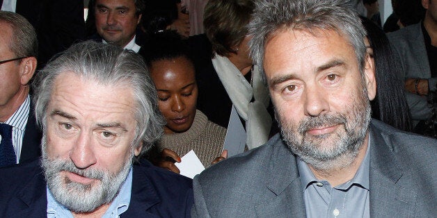 PARIS, FRANCE - SEPTEMBER 28: Robert De Niro, Luc Besson and Virginie Besson-Silla attend the Christian Dior Spring / Summer