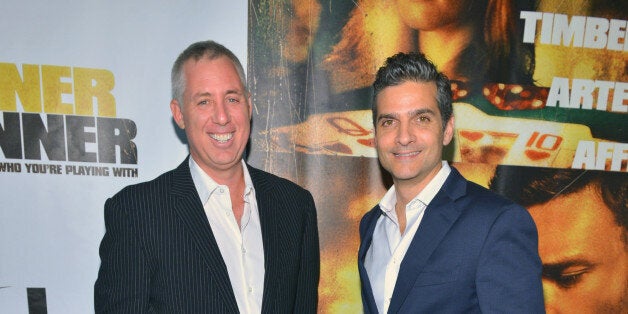 LAS VEGAS, NV - SEPTEMBER 18: Writers Brian Koppelman (L) and David Levien arrive at the world premiere of Twentieth Century Fox and New Regency's film 'Runner Runner' at Planet Hollywood Resort & Casino on September 18, 2013 in Las Vegas, Nevada. (Photo by Bryan Steffy/WireImage)