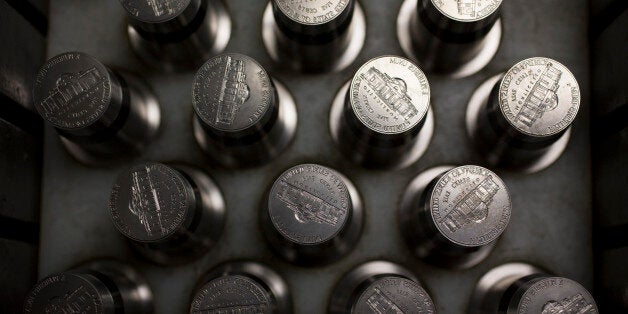 Dies used for pressing nickels sit in a tray at the U.S. Mint in Philadelphia, Pennsylvania, U.S., on Wednesday, July 17, 2013. Some sources of declining inflation 'are likely to be transitory' and expectations for future price increases 'have generally remained stable,' Ben S. Bernanke, chairman of the U.S. Federal Reserve said in prepared remarks. Photographer: Scott Eells/Bloomberg via Getty Images