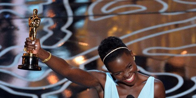 HOLLYWOOD, CA - MARCH 02: Actress Lupita Nyong'o accepts the Best Performance by an Actress in a Supporting Role award for '12 Years a Slave' onstage during the Oscars at the Dolby Theatre on March 2, 2014 in Hollywood, California. (Photo by Kevin Winter/Getty Images)