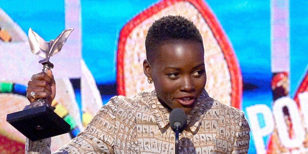 SANTA MONICA, CA - MARCH 01: Actress Lupita Nyong'o accepts the Best Supporting Female award for '12 Years a Slave' onstage during the 2014 Film Independent Spirit Awards at Santa Monica Beach on March 1, 2014 in Santa Monica, California. (Photo by Kevork Djansezian/Getty Images)