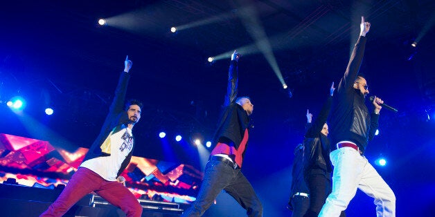 BARCELONA, SPAIN - FEBRUARY 20: Kevin Richardson, Brian Littrell and A.J. McLean of Backstreet Boys perform on stage at Sant Jordi Club on February 20, 2014 in Barcelona, Spain. (Photo by Jordi Vidal/Redferns via Getty Images)