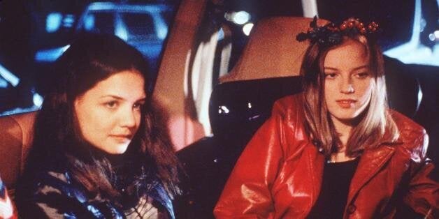 18-year-old Ronna (Sarah Polley, right), accompanied by reluctant partner-in-crime and fellow supermarket checkout clerk Claire (Katie Holmes), look to score some rent money before she's evicted on Christmas Eve in the Columbia Pictures presentation 'GO.' Columbia/TriStar