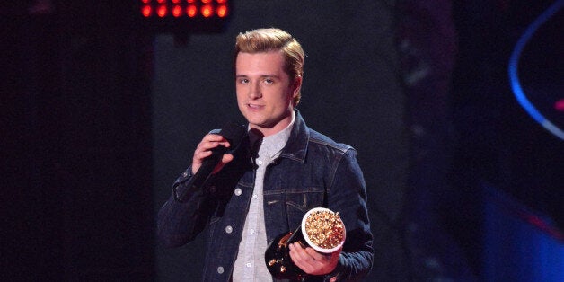 LOS ANGELES, CA - APRIL 13: Actor Josh Hutcherson speaks onstage at the 2014 MTV Movie Awards at Nokia Theatre L.A. Live on