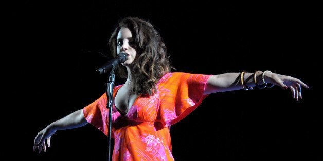 INDIO, CA - APRIL 13: Singer Lana Del Rey performs onstage during day 3 of the 2014 Coachella Valley Music & Arts Festival at the Empire Polo Club on April 13, 2014 in Indio, California. (Photo by Katie Stratton/Getty Images for Coachella)