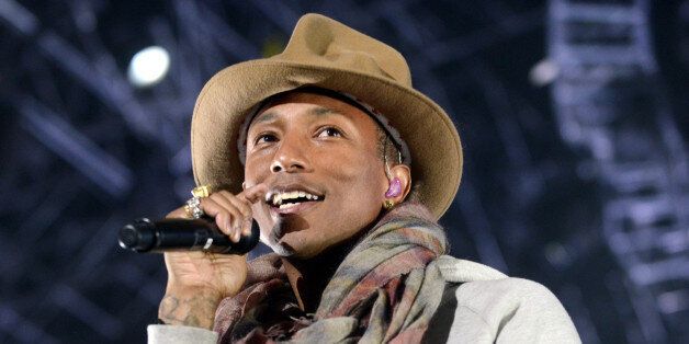 INDIO, CA - APRIL 12: Pharrell Williiams performs as part of the Coachella Valley Music and Arts Festival at The Empire Polo Club on April 12, 2014 in Indio, California. (Photo by Tim Mosenfelder/WireImage)