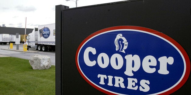 UNITED STATES - SEPTEMBER 17: A truck from the Cooper Tire & Rubber Company enters one of the company's distribution centers