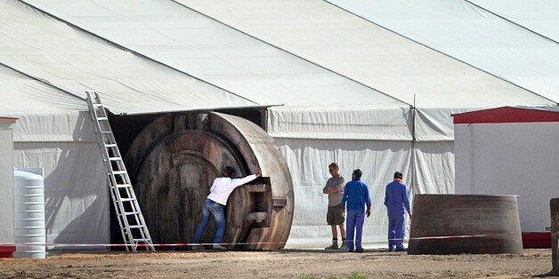 ABU DHABI - APRIL 15: Crews roll out an object believed to be part of the set of the newest Star Wars film being shot somewh