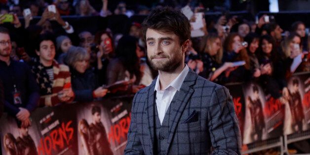 Actor Daniel Radcliffe poses for photographers upon arrival at the premiere of the film Horns, in central London, Monday, Oct. 20, 2014. (Photo by Joel Ryan/Invision/AP)