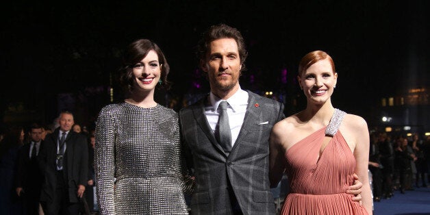 Actors Anne Hathaway, Matthew McConaughey and Jessica Chastain pose for photographers upon arrival at the premiere of the fil