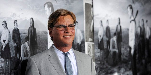 Aaron Sorkin, creator/executive producer of "The Newsroom," poses at the season 2 premiere of the HBO series at the Paramount Theater on Wednesday, July 10, 2013 in Los Angeles. (Photo by Chris Pizzello/Invision/AP)