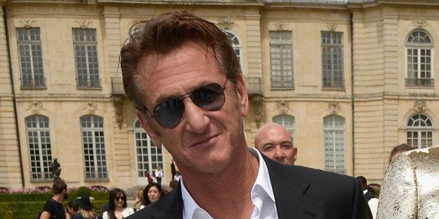 PARIS, FRANCE - JULY 07: Sean Penn attends at the Christian Dior show as part of Paris Fashion Week - Haute Couture Fall/Winter 2014-2015 at on July 7, 2014 in Paris, France. (Photo by Dominique Charriau/WireImage)