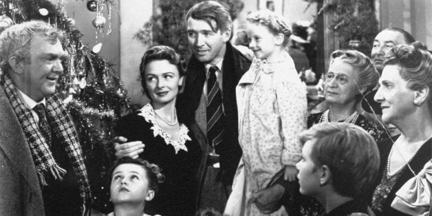 James Stewart, center, is shown in the last scene of Frank Capra's 1947 film "It's A Wonderful Life". Hollywood columnist Army Acherd reported the actor died, Wednesday, July 2, 1997 at his home in Beverly Hills. He was 89. (AP Photo)