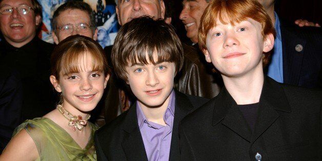 UNITED STATES - NOVEMBER 11: Emma Watson, Daniel Radcliffe and Rupert Grint (l. to r. front) get together at the New York premiere of 'Harry Potter and the Sorcerer's Stone' at the Ziegfeld Theater. They star in the film. (Photo by Richard Corkery/NY Daily News Archive via Getty Images)