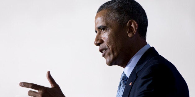 President Barack Obama speaks at the Federal Trade Commission (FTC) offices at the Constitution Center in Washington, Monday, Jan. 12, 2015, about his plan to improve confidence in technology by tackling identify theft and improving consumer and student privacy. The president wants Congress to pass legislation requiring companies to inform customers within 30 days if their data has been hacked, a move that follows high-profile breaches at retailers including Target, Home Depot and Neiman Marcus. (AP Photo/Carolyn Kaster)