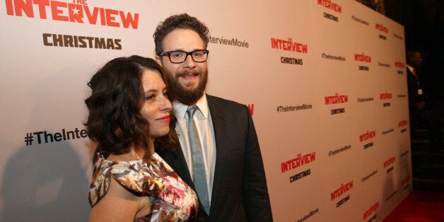 Lauren Miller and Director/Producer/Screenwriter Seth Rogen seen at Columbia Pictures World Premiere of "The Interview" on Thursday, Dec 11, 2014, in Los Angeles. (Photo by Eric Charbonneau/Invision for Sony Pictures/AP Images)