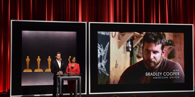 BEVERLY HILLS, CA - JANUARY 15: Actor Chris Pine and Academy President Cheryl Boone Isaacs announce Bradley Cooper as a nomi