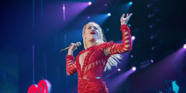 CHICAGO, IL - DECEMBER 18: Singer Rita Ora performs onstage during 103.5 KISS FM's Jingle Ball 2014 at Allstate Arena on December 18, 2014 in Chicago, Illinois. (Photo by Jeff Schear/WireImage)