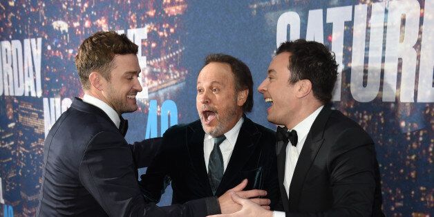 SATURDAY NIGHT LIVE 40TH ANNIVERSARY SPECIAL -- Pictured: (l-r) Justin Timberlake, Billy Vrystal, and Jimmy Fallon walk the red carpet at the SNL 40th Anniversary Special at 30 Rockefeller Plaza in New York, NY on February 15, 2015 -- (Photo by: Jamie McCarthy/NBC/NBCU Photo Bank via Getty Images)