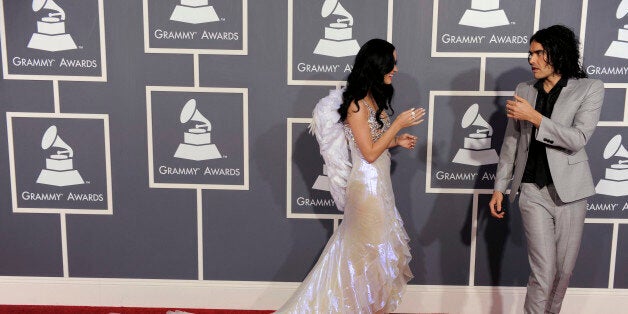 Katy Perry, left, and Russell Brand arrive at the 53rd annual Grammy Awards on Sunday, Feb. 13, 2011, in Los Angeles. (AP Photo/Chris Pizzello)