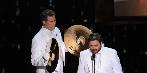 Actors Will Ferrell and Zach Galifianakis present the Oscar for Song onstage at the 84th Annual Academy Awards on February 26, 2012 in Hollywood, California. AFP PHOTO Robyn BECK (Photo credit should read ROBYN BECK/AFP/Getty Images)