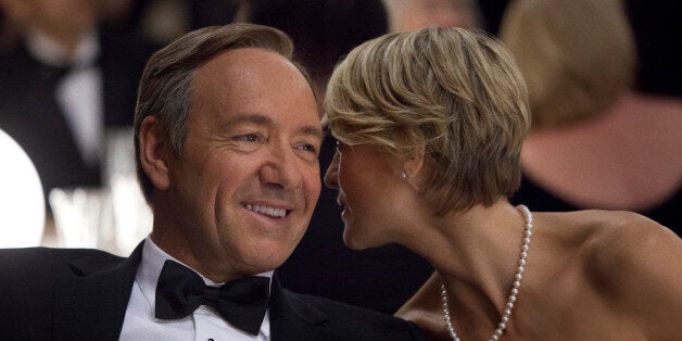 This image released by Netflix shows Kevin Spacey as U.S. Congressman Frank Underwood, left, and Robin Wright as Claire Underwood in a scene from the Netflix original series, "House of Cards." The new original series arrived in one big helping _ all 13 episodes of its first season _ on the subscription streaming service on Friday, Feb. 1, 2013, for viewers to enjoy, at their leisure, in the weeks, months or even years to come. (AP Photo/Netflix, Melinda Sue Gordon) (AP Photo/Netflix)