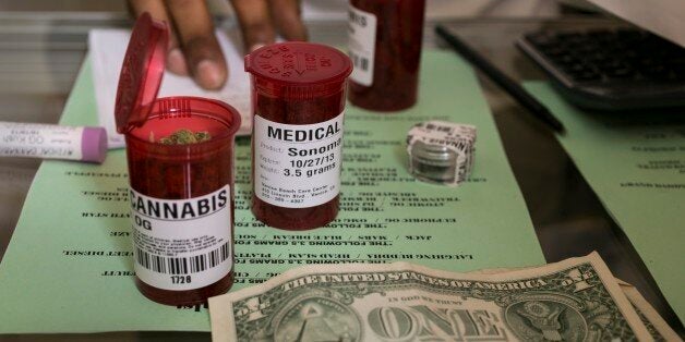 In this photo taken Tuesday, May 14, 2013, Medical marijuana prescriptions vials are filled at the Venice Beach Care Center m